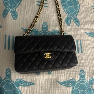 Chanel Quilted Black Shoulder Bag with Gold Accents